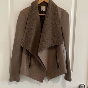 Faux shearling jacket with knit sleeves